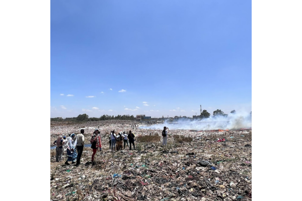 Image Waste pickers during their visit to the Dandora Dumpsite, in Nairobi, Kenya